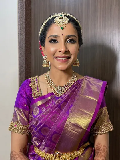 A classic indoor portrait showing how the makeup looks flawless even away from natural light. The finish is smooth, radiant, and ready for any camera.