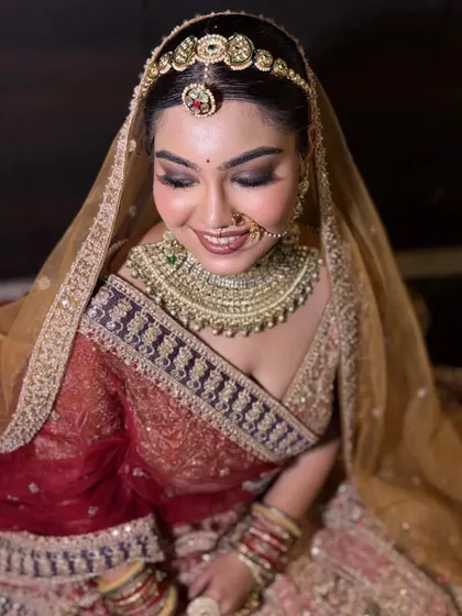 A close-up of the soft brown smokey eye and flawless skin. This look is perfect for brides who want something glamorous yet understated.