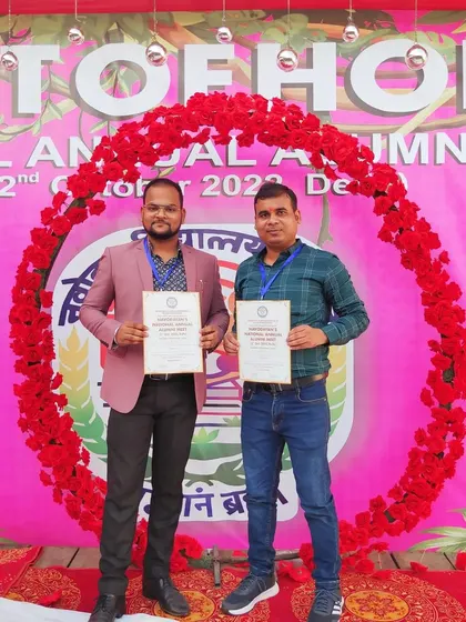 Receiving a certificate of appreciation at the Jawahar Navodaya Vidyalaya alumni meet. My education provided a strong foundation, and I remain actively involved in giving back to the community.