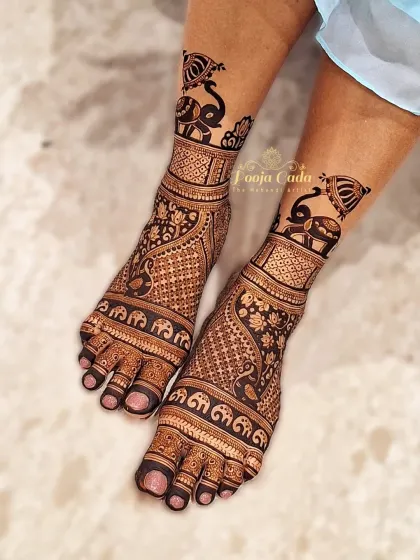 A classic design featuring a procession of elephants along the foot, with intricate paisley patterns filling the rest of the space.