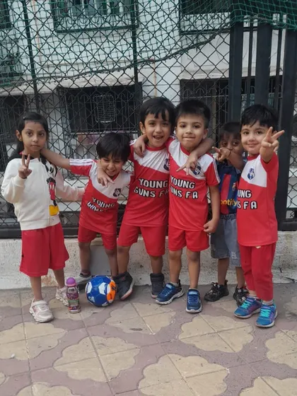 Friends on and off the field! This heartwarming photo shows a group of teammates posing together, a testament to the strong bonds formed in our academy.