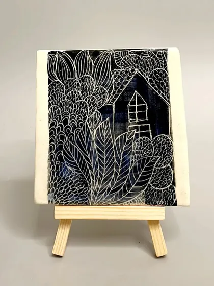 Another look at the sgraffito house tile, a unique piece of art to decorate your walls or tabletops. Visit my website to see the full collection of ceramic tiles.