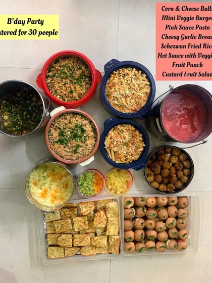 This was a fun birthday party I catered for 30 people. The menu included crowd-pleasers like Jain Pink Sauce Pasta, Schezwan Fried Rice, Mini Veggie Burgers, and Corn & Cheese Balls.