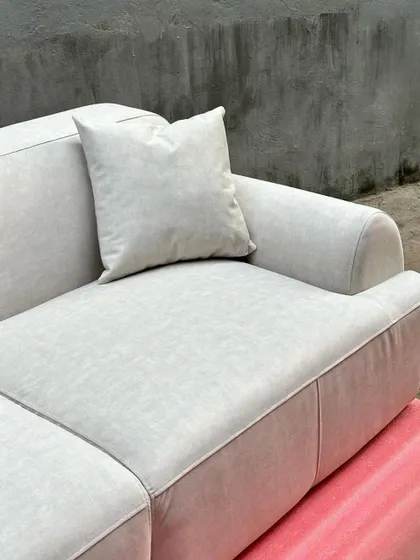 Another close-up of the sofa, highlighting the comfortable seating and backrest cushions.