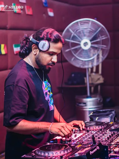 These shots capture me in my element, from different angles and at various events. Each one is a glimpse into my life as a music maker, focused on the craft and connecting with the crowd.
