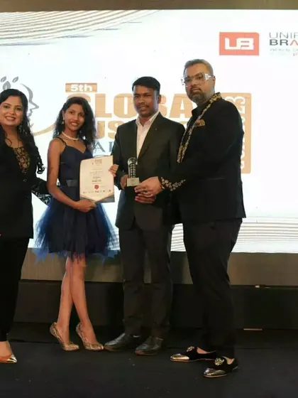 Another shot of our team accepting an award, highlighting our consistent recognition for excellence.