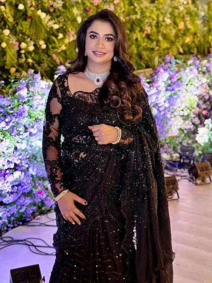 A duplicate of 268, showing the full black saree look.