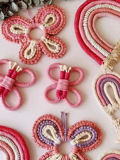 How much pink is too much pink? Here is a collection of my pink-themed macrame creations, including rainbows, butterflies, and a hot air balloon.