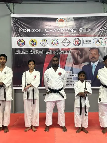 Our newly qualified Black Belts standing with their instructor. This achievement was qualified by Shihan Dr. A Jebamani of the Asian Karate Federation, reflecting our high standards.