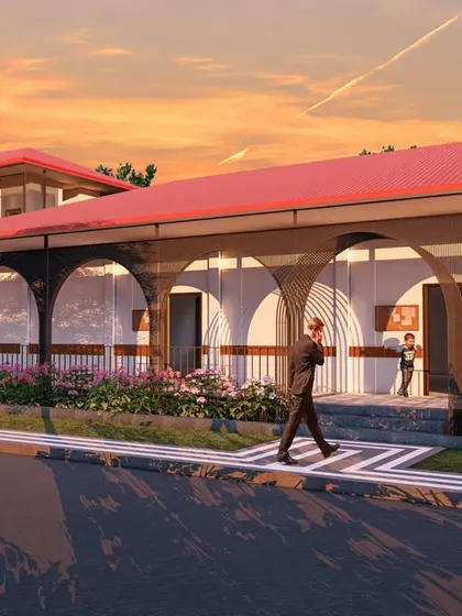 The design for the UNACCO School's primary block in Mamangpat features a rhythmic series of arches, creating a sheltered walkway that is both functional and aesthetically pleasing.