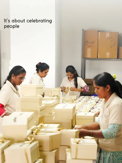For us, it's about celebrating people. Our team is seen here assembling gift boxes, each one a token of appreciation from one person to another.
