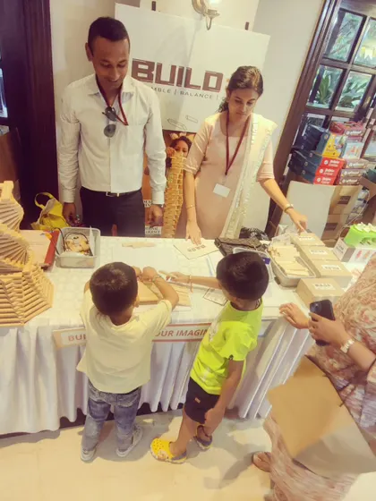 My pop-up stalls at events always draw in curious minds. It's a wonderful opportunity to interact with a diverse group of people and see young children immediately grasp the concept of building with blocks, completely absorbed in their creations.