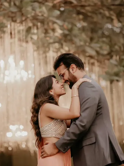 An intimate portrait with beautiful bokeh from the fairy lights. I love using the decor to create a magical, romantic atmosphere for couple photos.