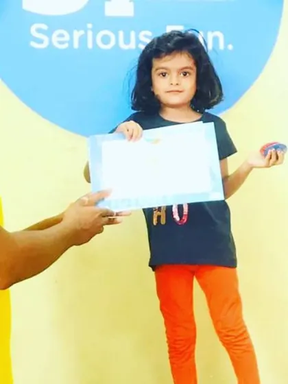 Photos from our "Show Week 2020," where students proudly display their certificates of achievement. It's a wonderful celebration of their hard work and progress.