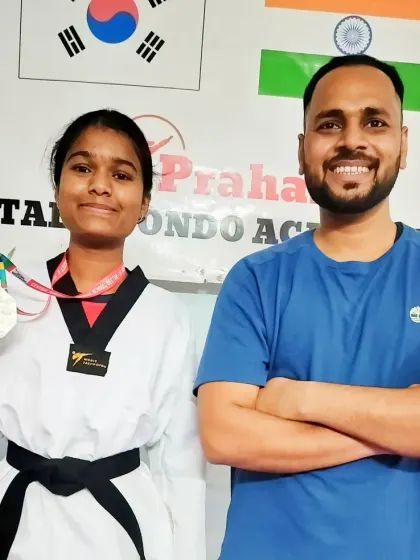 A junior female student with her silver medal from the 2nd Delhi Taekwondo State Championship. We train athletes for both Kyorugi and Poomsae events.