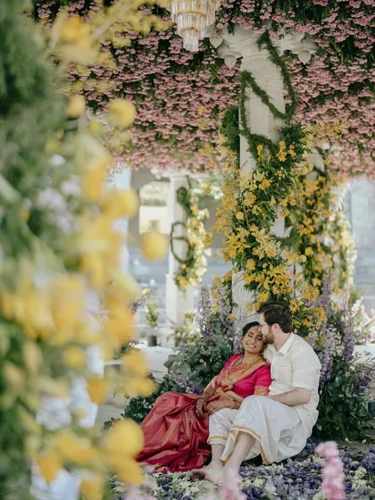 A perfect blend of two cultures, this ceremony for Nithya and Payton took place under a sky of fresh flowers. Our team of florists worked tirelessly to construct this vibrant, joyful setting in the beautiful Nandi Hills.