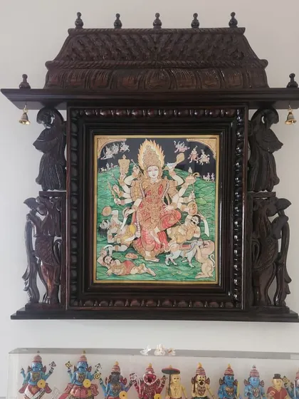 Divinity framed and cherished. Our exquisite Mysore painting of Goddess Chamundeshwari finds its perfect home in this traditional wooden frame, adding grace and blessings to our client’s space.