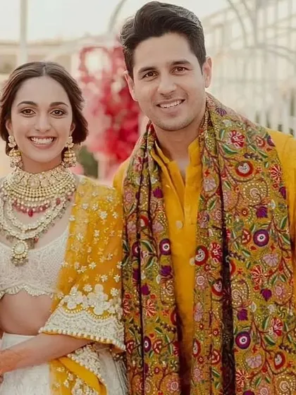 Kiara Advani and Sidharth Malhotra's coordinated mehendi looks were iconic. I can help you and your partner create a similar vibrant and happy theme for your own celebration.