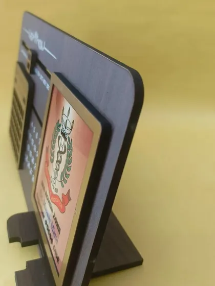 The infinity calendar also functions as a phone stand, making it a very practical and useful desk accessory.