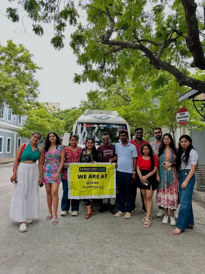 Our Pondicherry group standing by our traveler van, ready to explore the city.
