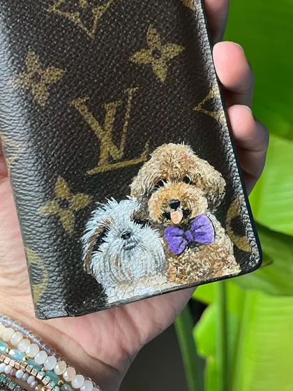 Puppy portraits are one of my favorite things to paint. Here, I've hand-painted two adorable dogs on a Louis Vuitton wallet, a beautiful and functional way to keep your best friends close.