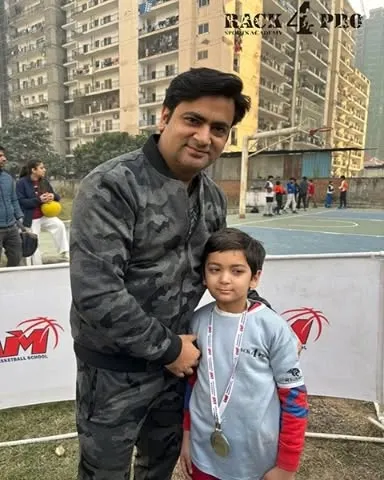One of our youngest achievers from the U-8 category with his father and a well-earned medal from the winter league. We encourage parental support and celebrate every milestone, big or small.