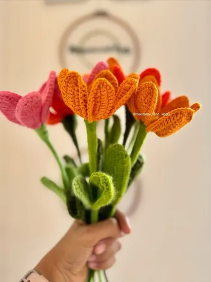 A side view of the open tulip bouquet, highlighting the shape of the petals and the delicate, curly leaves I add to each stem for a more realistic touch.