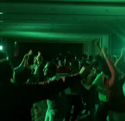 Another angle of the energetic dance floor at the ABB corporate event.