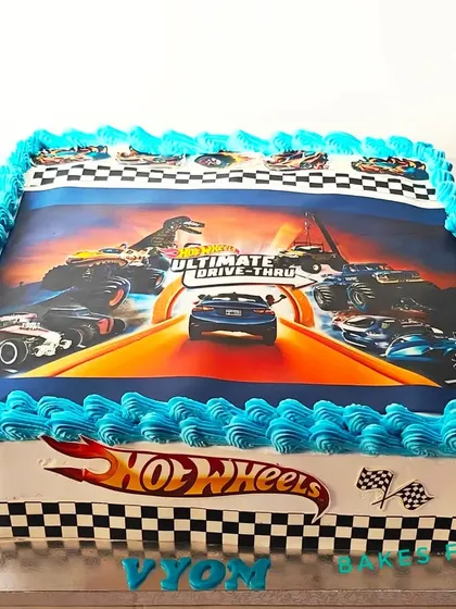 A large, rectangular Hot Wheels cake with an edible image of a race track. This is a great option for serving a larger party while sticking to the theme.
