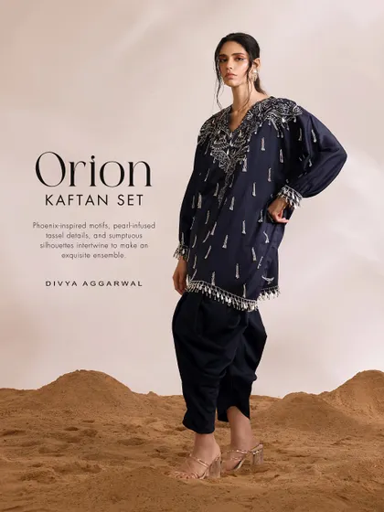 The Orion Kaftan Set, a perfect example of refined craftsmanship with its intricate tassel embellishments and enchanting aura.