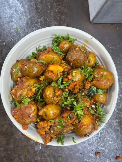 The finished bowl of Kerala-style baby potato roast. Bold, beautiful, and packed with flavor, this is a vegetarian side dish that can easily be the star of the meal.