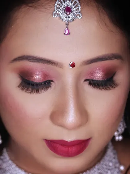 Another angle of the beautiful glittery eye makeup, showing how it catches the light.