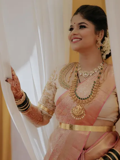 A lovely shot of the bride, highlighting her glowing skin and happy smile.