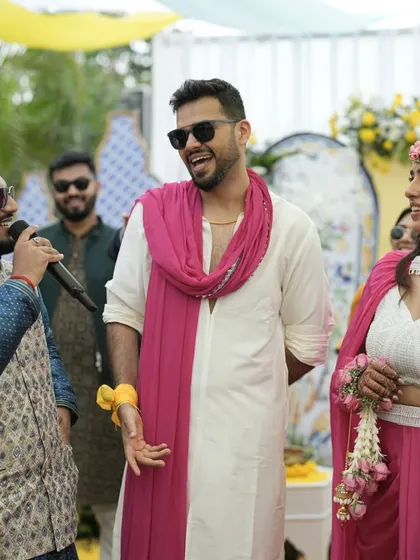 Sharing a laugh with the couple during their Haldi. My job is to keep the mood light, fun, and full of smiles.
