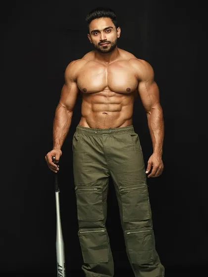 Full body shot from the photoshoot, showcasing a balanced and aesthetic physique.