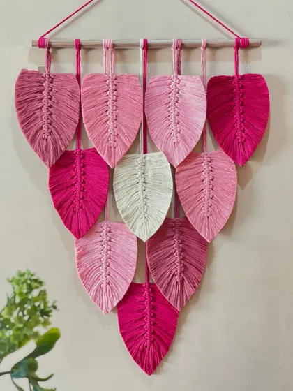 This custom piece was made for a client who loves pink. I used multiple shades, from soft blush to vibrant magenta, to create this beautiful and feminine leaf wall hanging.