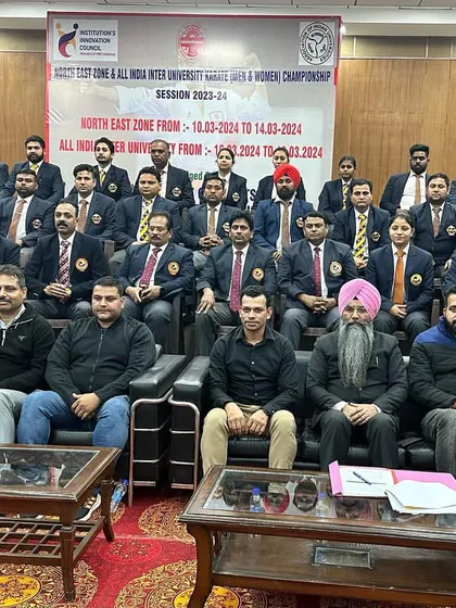 A series of photos showing the dedicated group of officials, judges, and technical committee members from the North East Zone & All India University Karate Championship. It takes a large, coordinated team to run a successful national-level event.