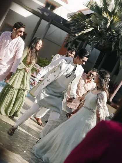 A candid moment of the couple dancing with their friends during their Haldi ceremony. We encourage these spontaneous dance moments that make for the best pictures and memories.