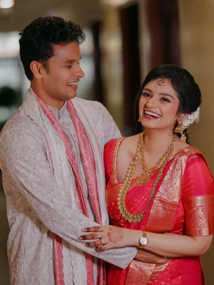 During their engagement ceremony, a couple shares a moment of pure, unscripted laughter. I focus on capturing these genuine emotions that make your event unique.