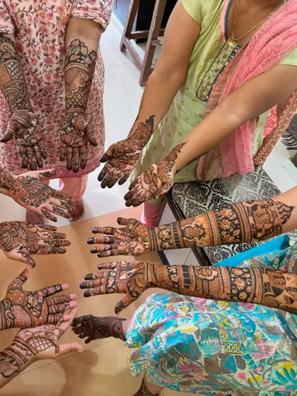 More hands, more happiness. We love being part of the fun and laughter of a family mehndi ceremony.