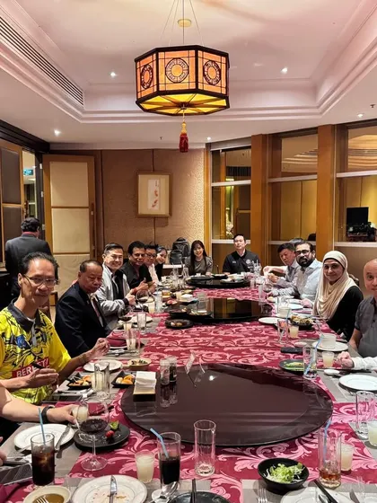 Attending a VIP Welcome Dinner in Bangkok for the Thailand Open Karate Championship, seated with other international federation heads.