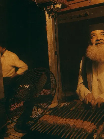 This is my father, Mohammed Yaseen, the original 'Bademiya'. This picture captures him at his stall, where it all began. His vision and his values are the foundation on which we stand today, and his warmth still feeds us all.