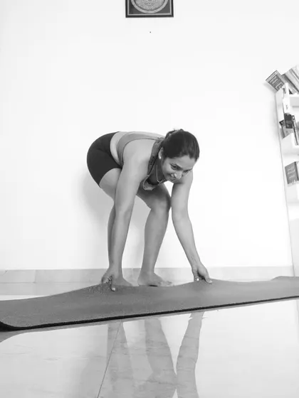 This is the moment before a class begins, rolling out the mat with a smile. It’s a ritual, a signal to your mind and body that it's time to connect. Even when a friend joins, we negotiate the intensity, because every practice is personal.