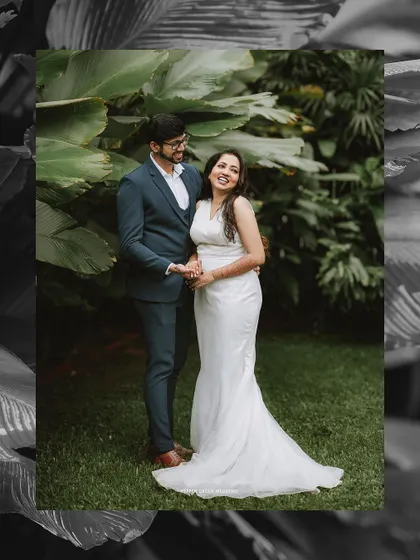 A stylish framed portrait of the couple in a garden, the black and white edit adding a timeless feel.