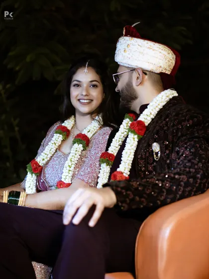 A sweet moment between the couple. The bride's natural reception makeup looks stunning in the professional photos.