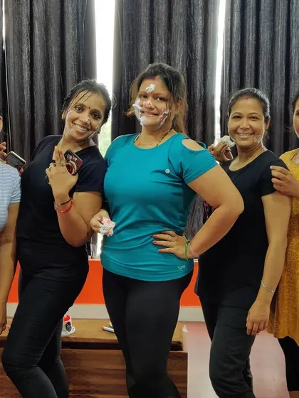 The aftermath of a fun birthday cake smash. These moments of pure joy and friendship are what make our fitness community so unique and strong.