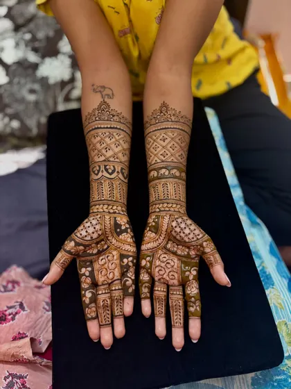 A clearer view of the intricate elephant and geometric patterns, showing the fresh application of my organic henna paste.