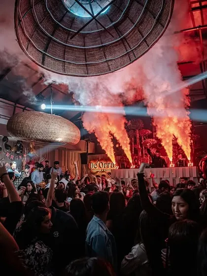 The view of the dance floor as the CO2 jets and light beams cut through the haze. It’s all about creating a dynamic and visually stunning environment.