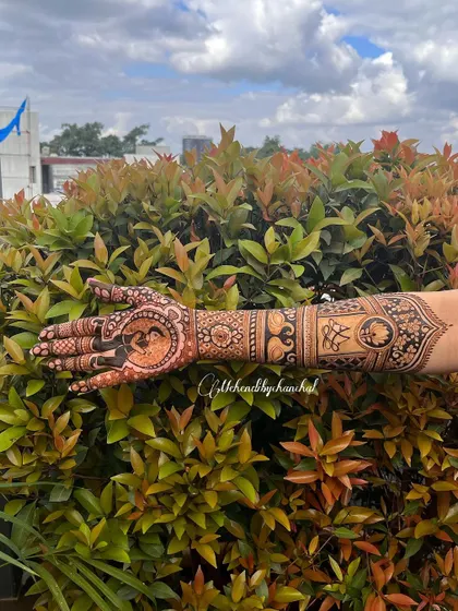 A full-arm view of the engagement portrait mehendi, showing how the entire design comes together.