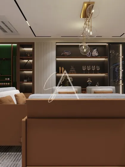 The view from behind the sofas in the billiard room, looking towards the custom bar and storage. The design ensures that every angle of the room is visually pleasing and functional.